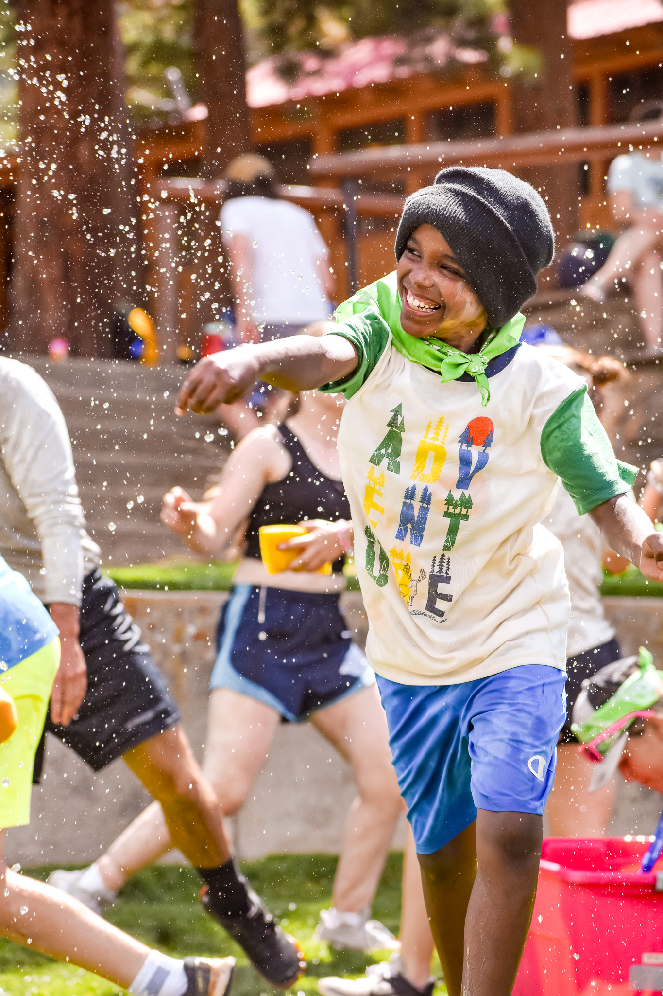 Camper smiling during a Summer Burn Camp water activity